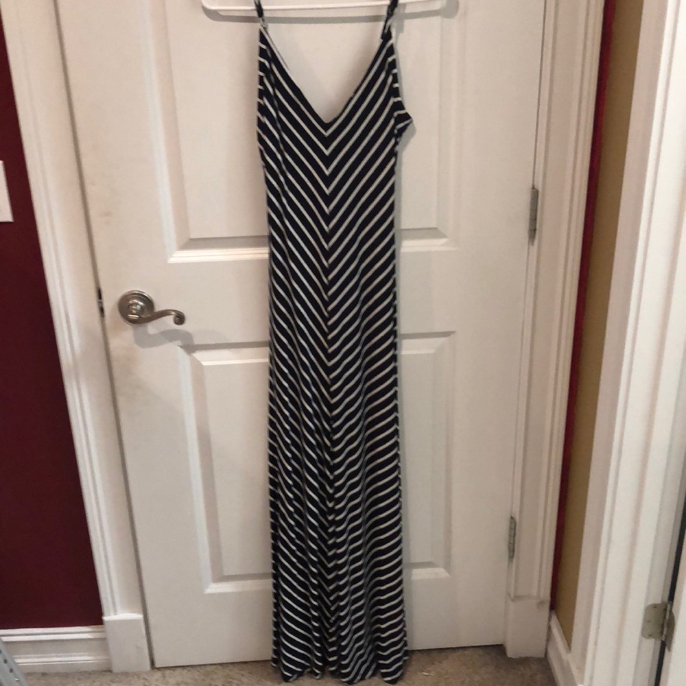 V-neck, spaghetti strapped Maxi dress.